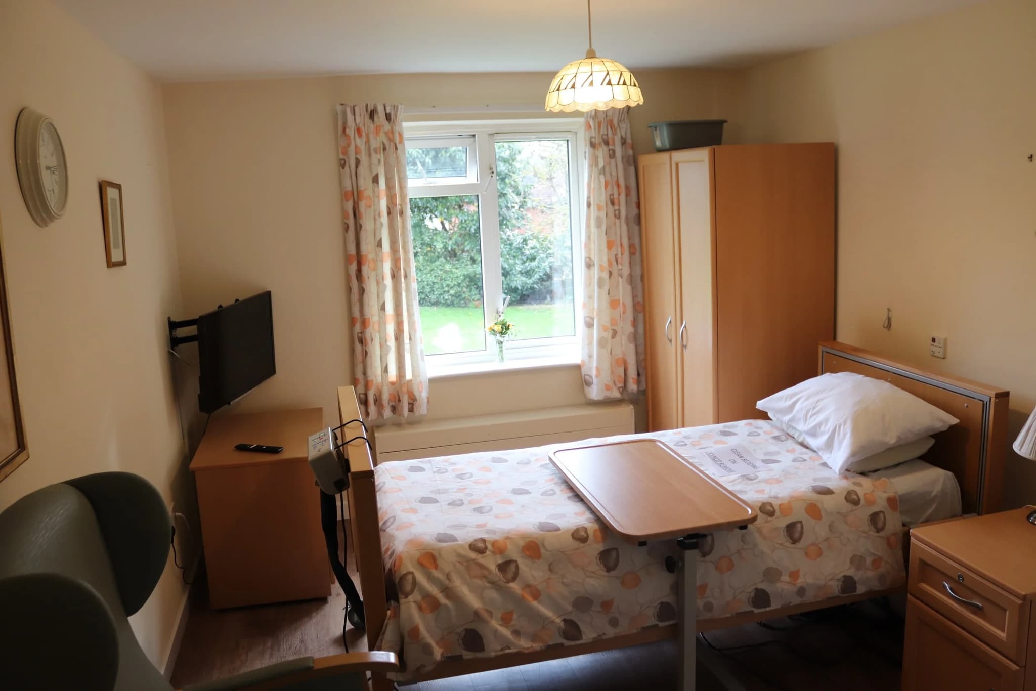 Spacious clinical care bedroom with electronic profiling bed